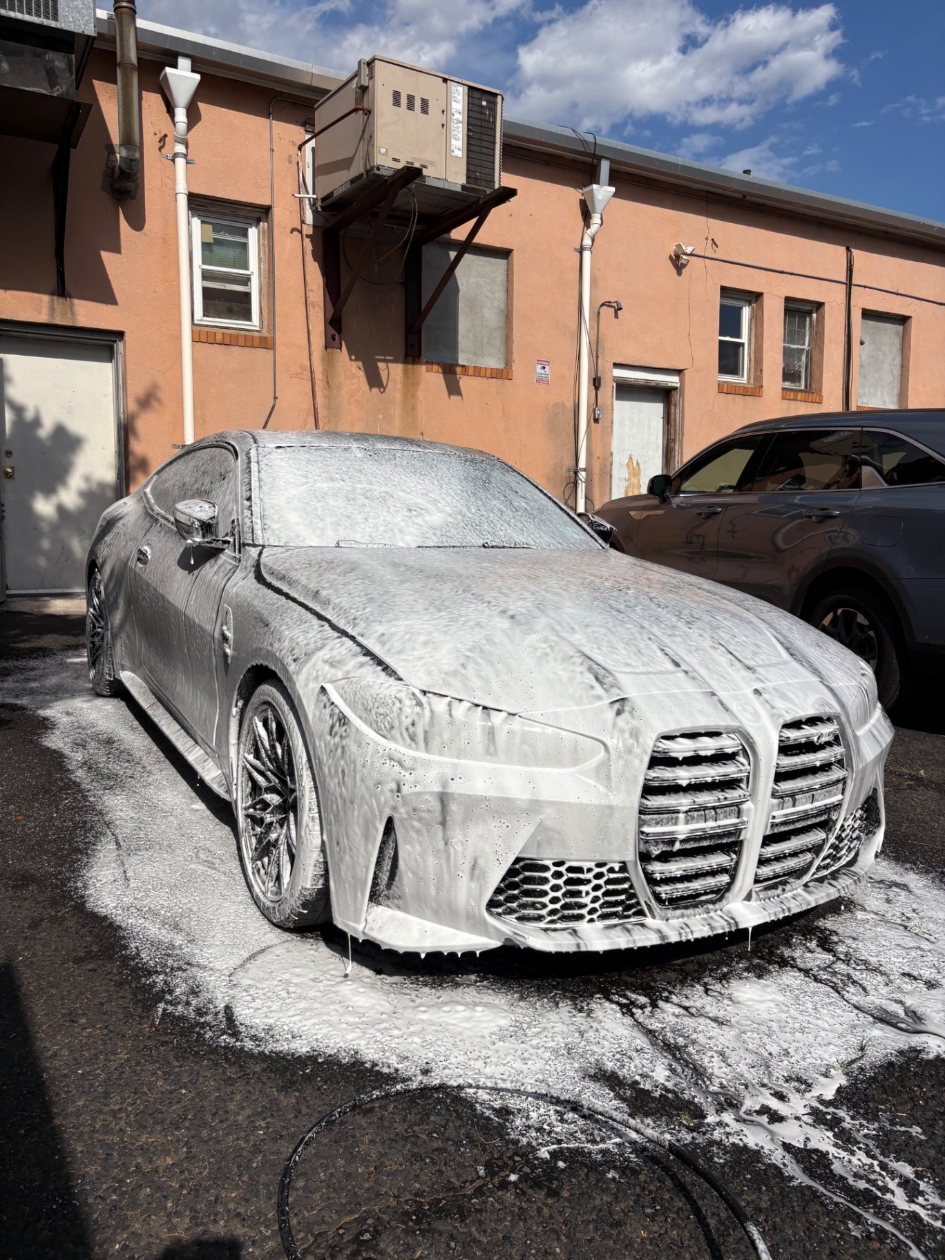 BMW M4 Competition — Two-bucket foam wash by M3 Luxury Auto Spa